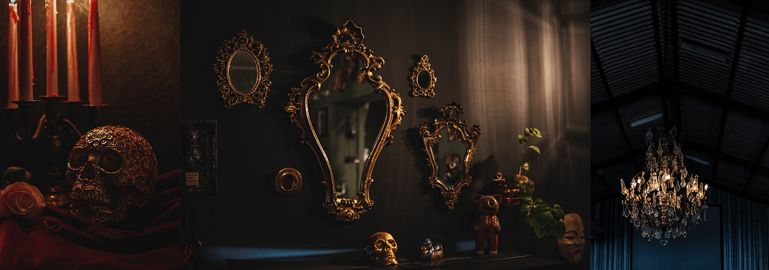 A row of images featuring Goth decor, including a gold skull in a dark room with candles dripping red wax, ornate gold mirrors on a black wall and a crystal chandelier in a dark space with high ceilings.